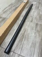 NOS GM 1986-1989 Cadillac Fleetwood rear bumper molding impact strip