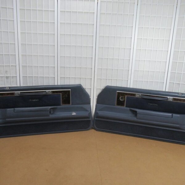 1978-1988 Oldsmobile Cutlass blue woodgrain crank door panels