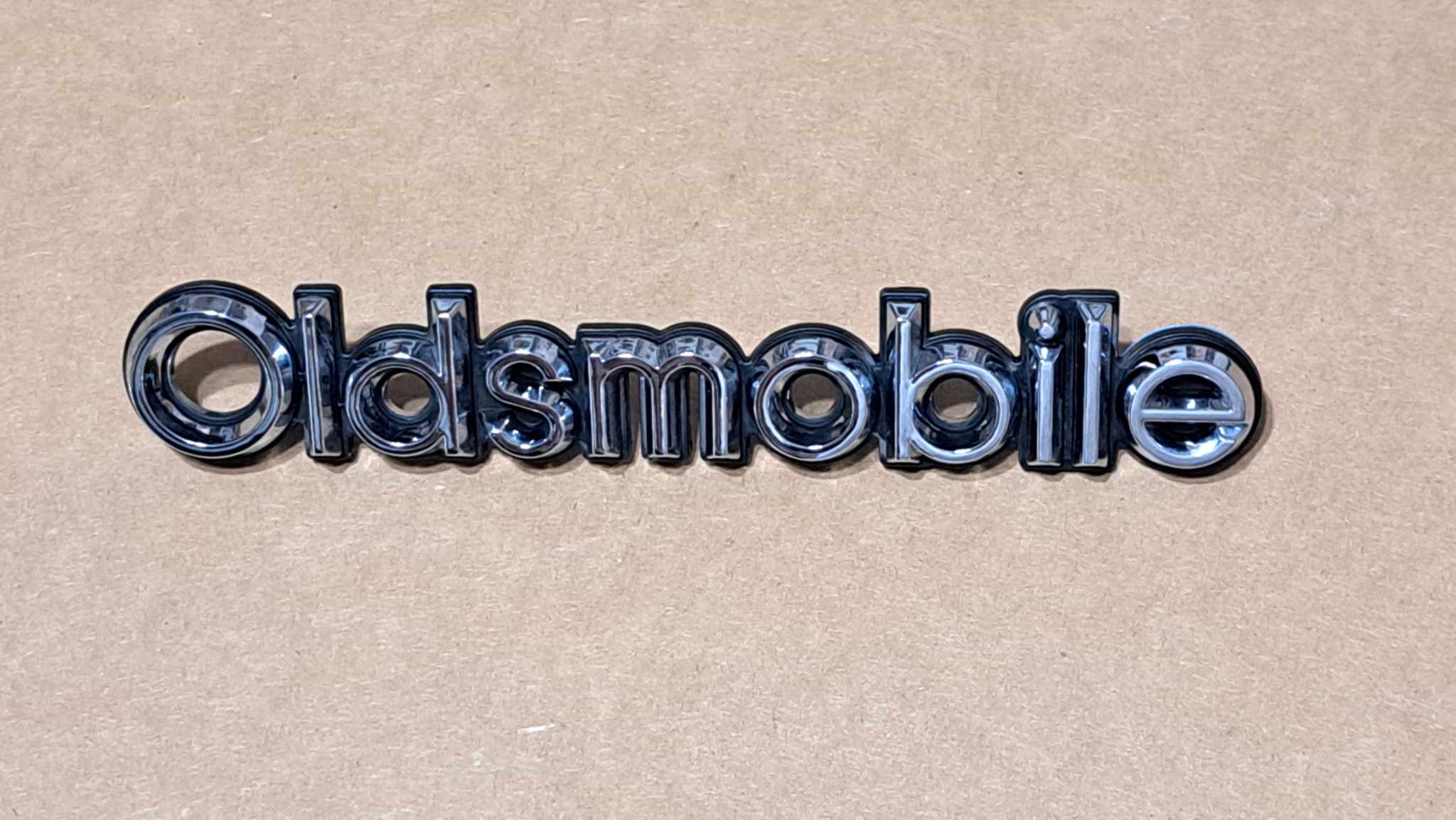 1981-1988 cutlass front bumper cover emblem with studs