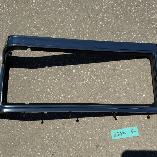 1992 Cadillac Brougham European headlight bezels pair