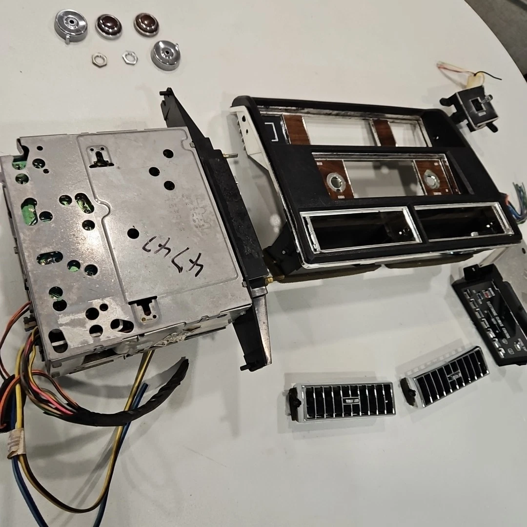 1983-1986 Cadillac DeVille Fleetwood radio bezel climate control