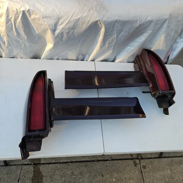 1993-1996 Cadillac Fleetwood Brougham red lens rear taillights filler