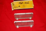1967 Bonneville Grand Prix cornering light lenses NOS