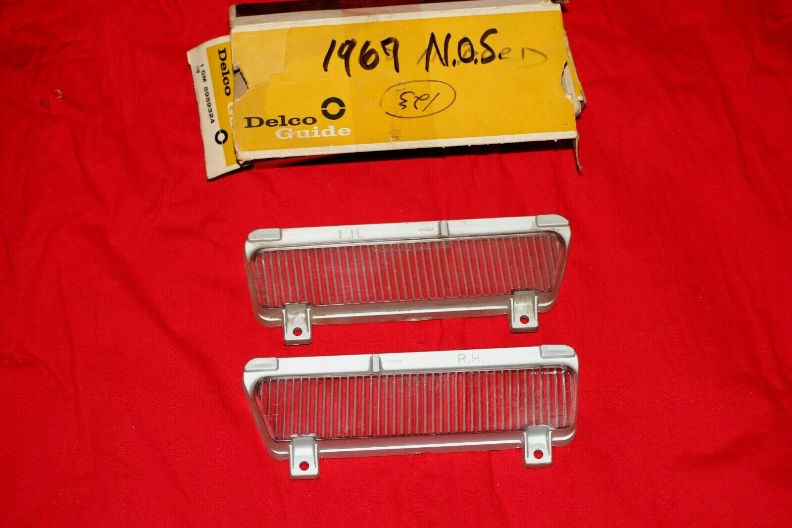 1967 Bonneville Grand Prix cornering light lenses NOS