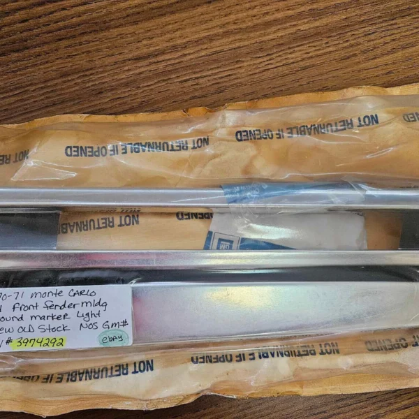 1970-1972 Monte Carlo front fender lower molding LH RH NOS