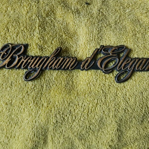 90-92 Cadillac Fleetwood Brougham D'Elegance Quarter Panel Emblem Name Plate