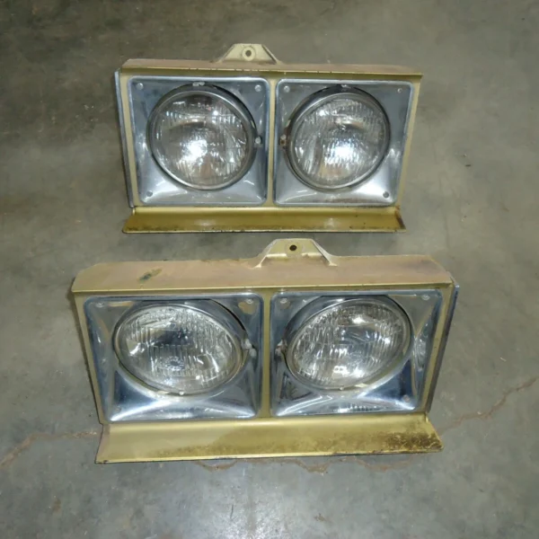 1974 Cadillac DeVille headlight panels with bezels