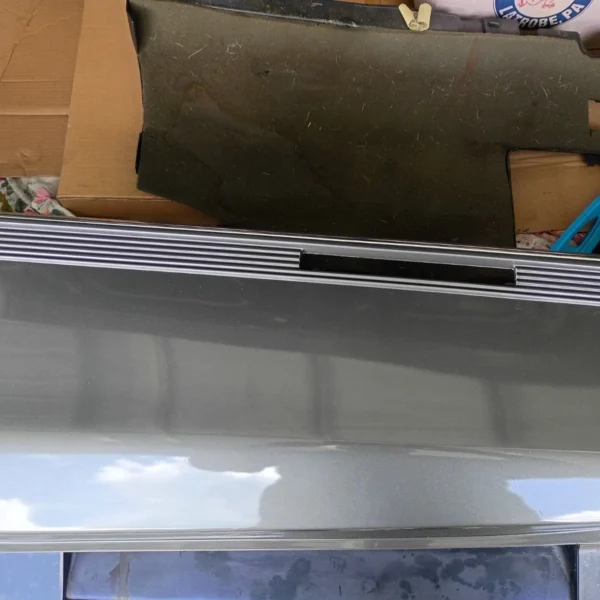 1989-1990 Cadillac Fleetwood FWD left quarter panel lower trim cladding