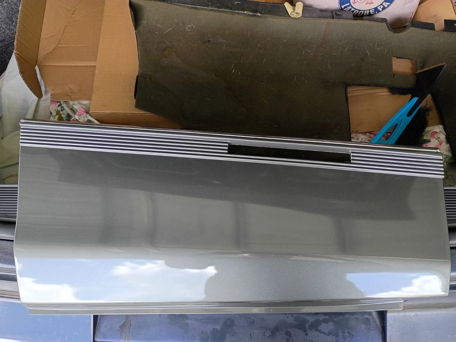 1989-1990 Cadillac Fleetwood FWD left quarter panel lower trim cladding