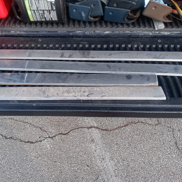1990-1992 Cadillac Brougham door rocker trim molding set