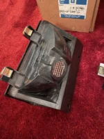 NOS GM Cadillac DeVille rear reflector light set