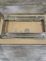 NOS GM Oldsmobile Delta 88 headlight marker trim bezel left