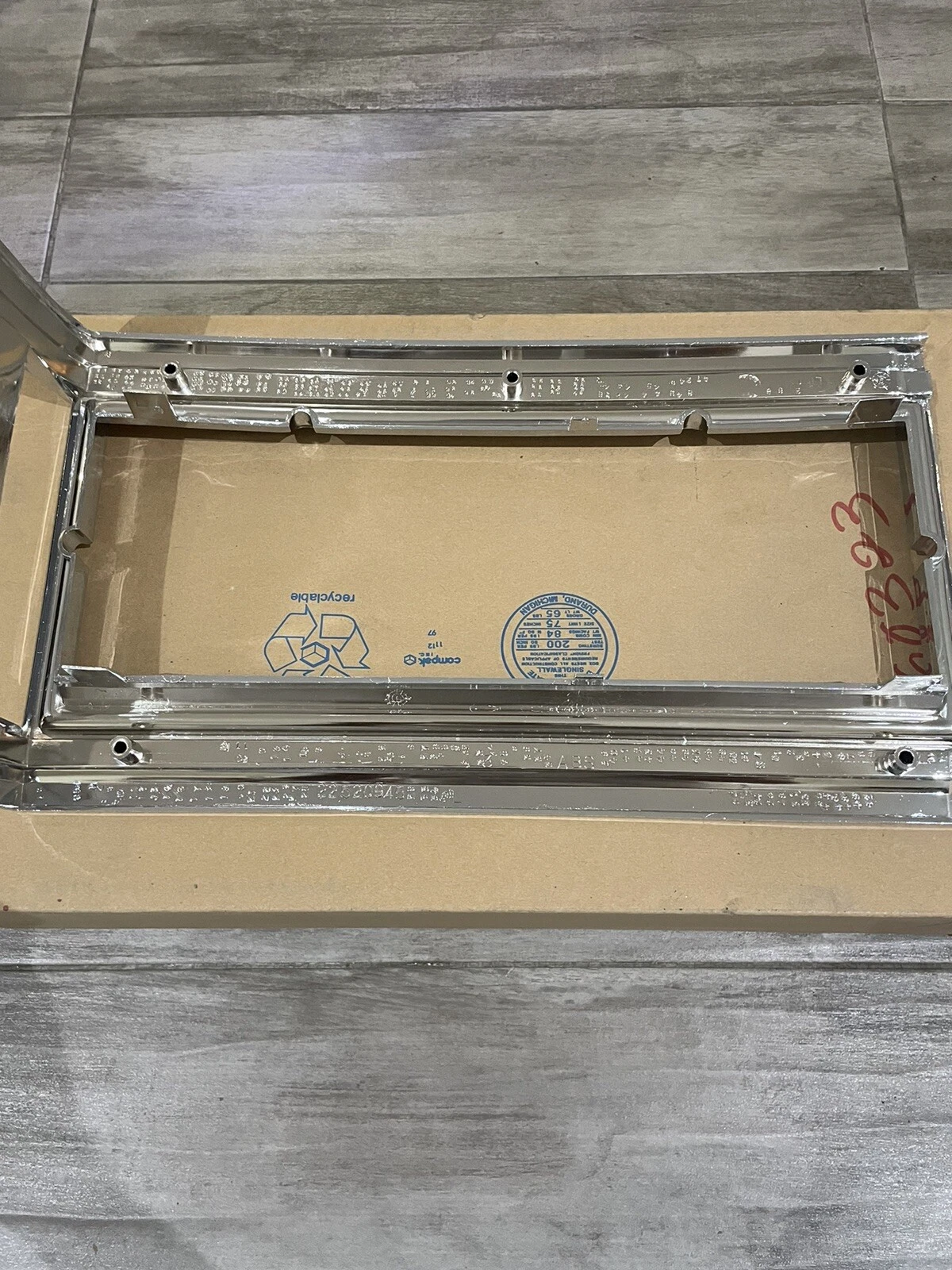 NOS GM Oldsmobile Delta 88 headlight marker trim bezel left