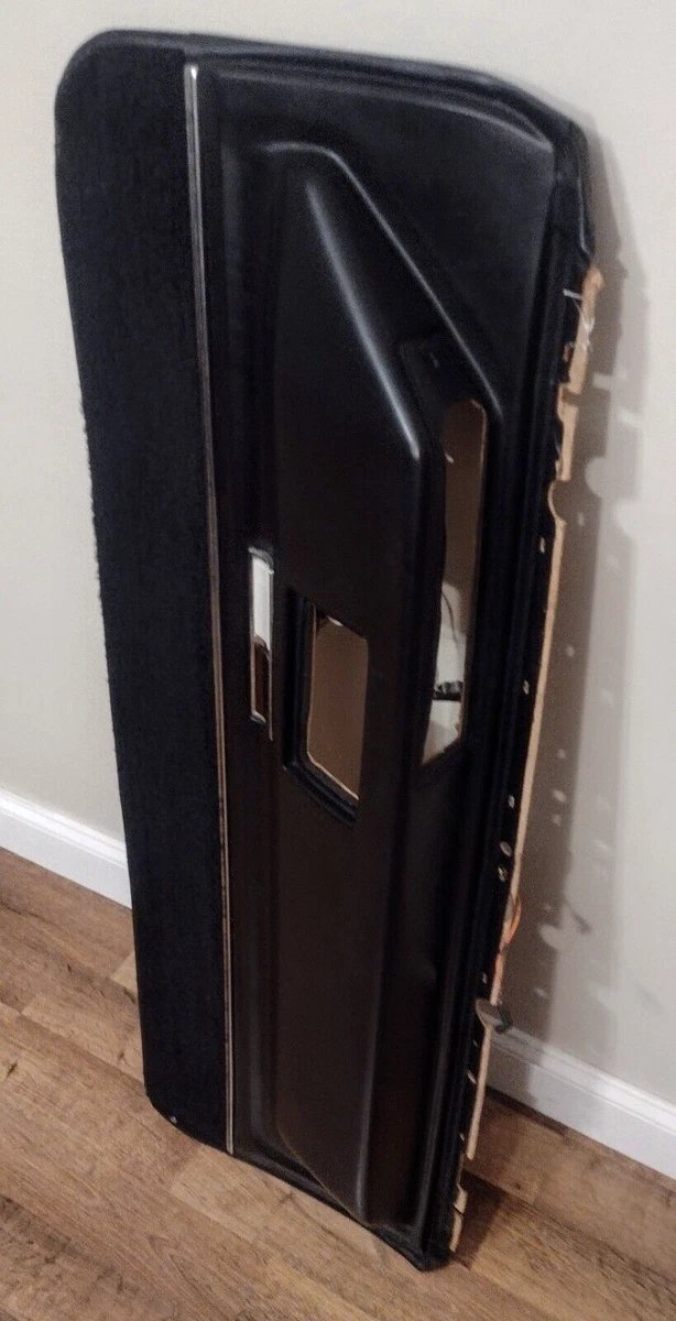 1970 Cadillac black lower door trim pad armrest panel passenger side